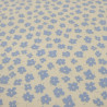 Cotton Poplin with Sky Blue Flower on a Beige Background - Maison Klem