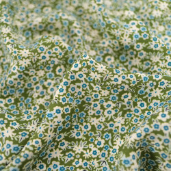 Viscose with a small blue floral print on a khaki background - Maison Klem