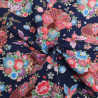 Cotone stampato con lurex, meravigliosi fiori su sfondo blu - Maison Klem