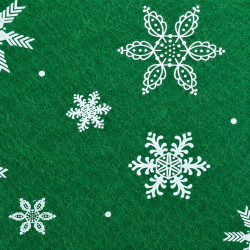 Green felt with white snowflake patterns