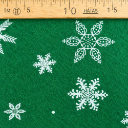 Green felt with white snowflake patterns